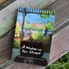 picture of the book a window on our street: sondering through northcote during covid-19 on a wooden bench